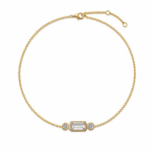 Bracelet ELYSIA en or jaune 18 carats avec diamant taille émeraude central et deux diamants ronds
