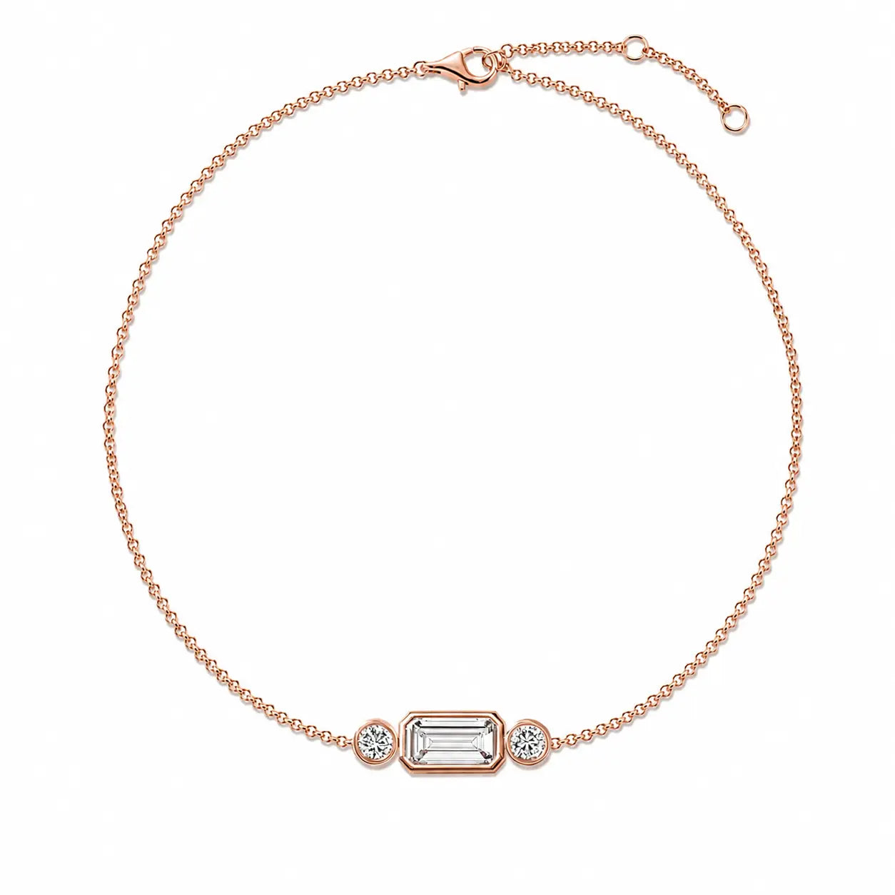 Bracelet ELYSIA en or rose 18 carats avec diamant taille émeraude central et deux diamants ronds