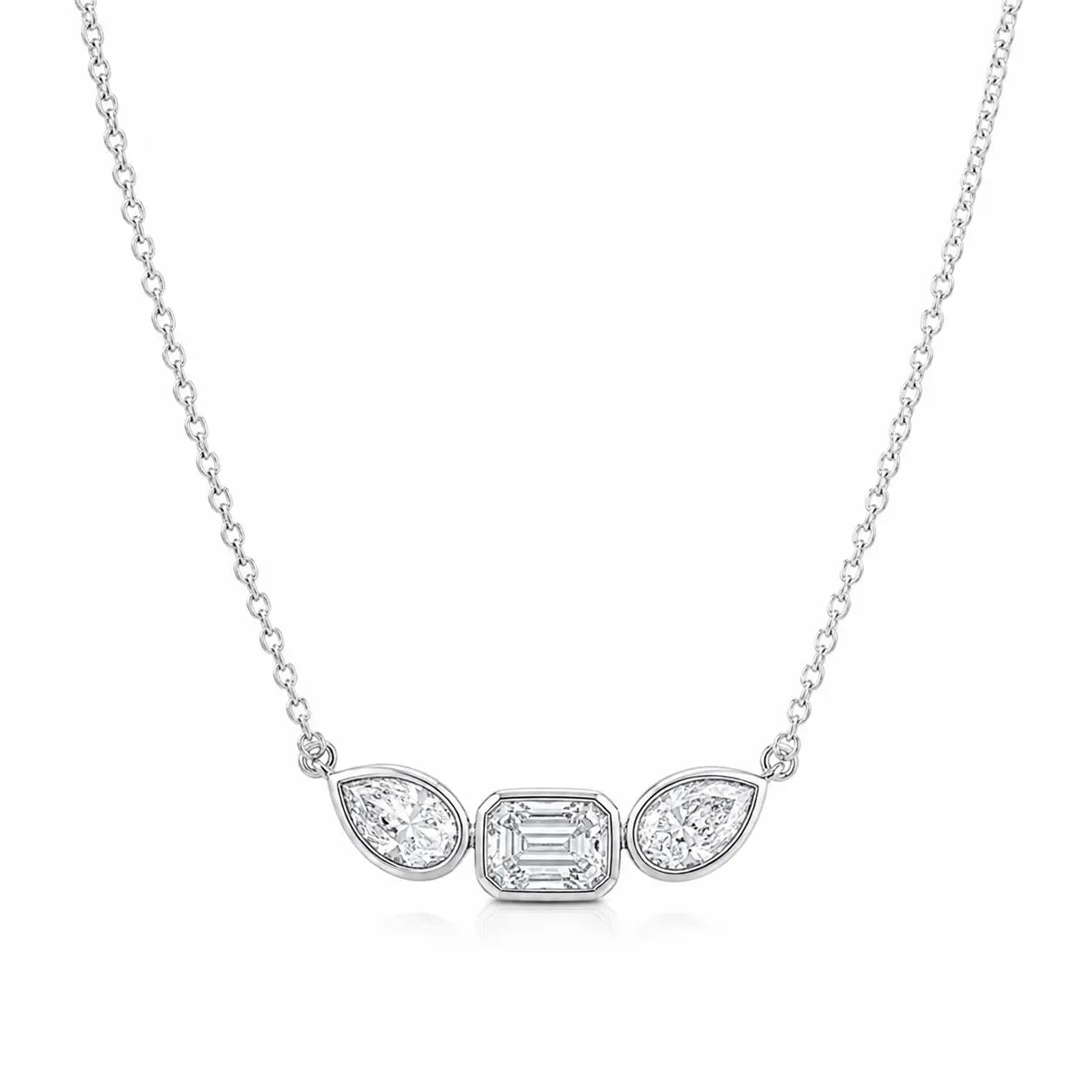 Collier double diamant poire et émeraude