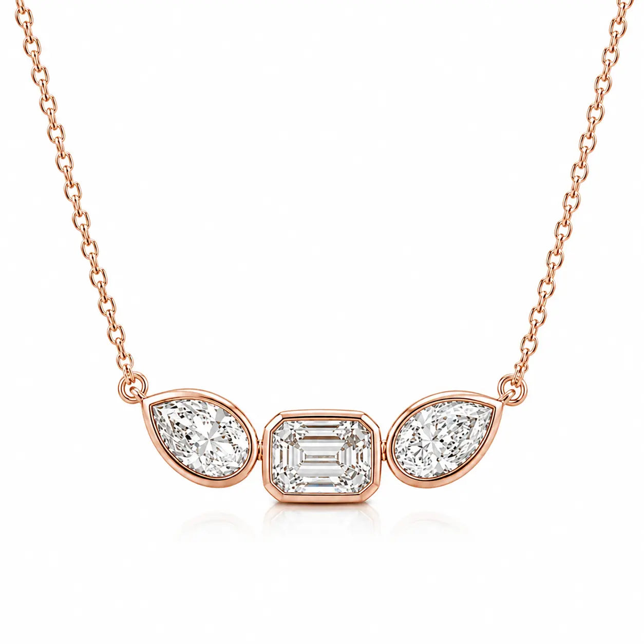 Collier double diamant poire et émeraude
