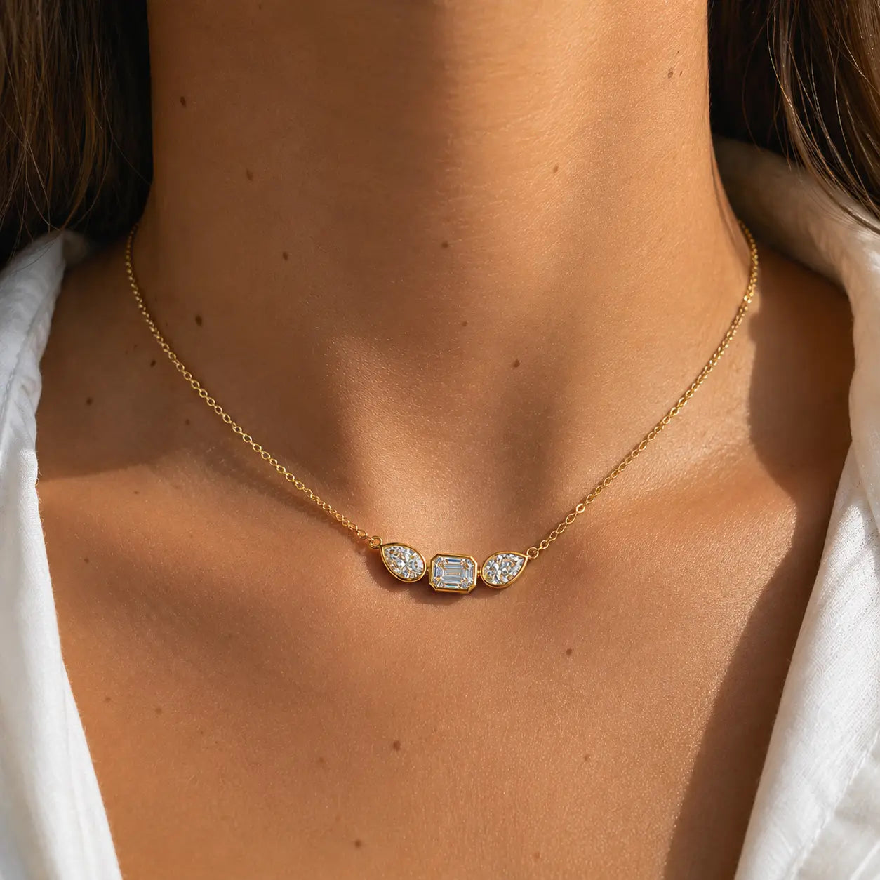 Collier double diamant poire et émeraude