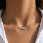 Collier double diamant poire et émeraude