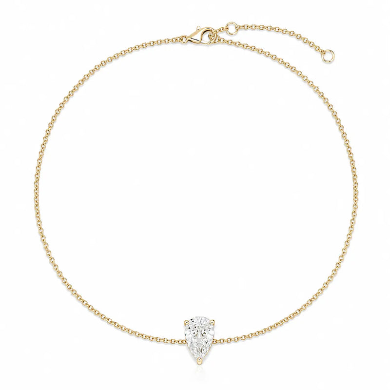 Bracelet LEANNA en or jaune 18 carats avec diamant poire de laboratoire – vue complète avec chaîne ajustable et fermoir mousqueton